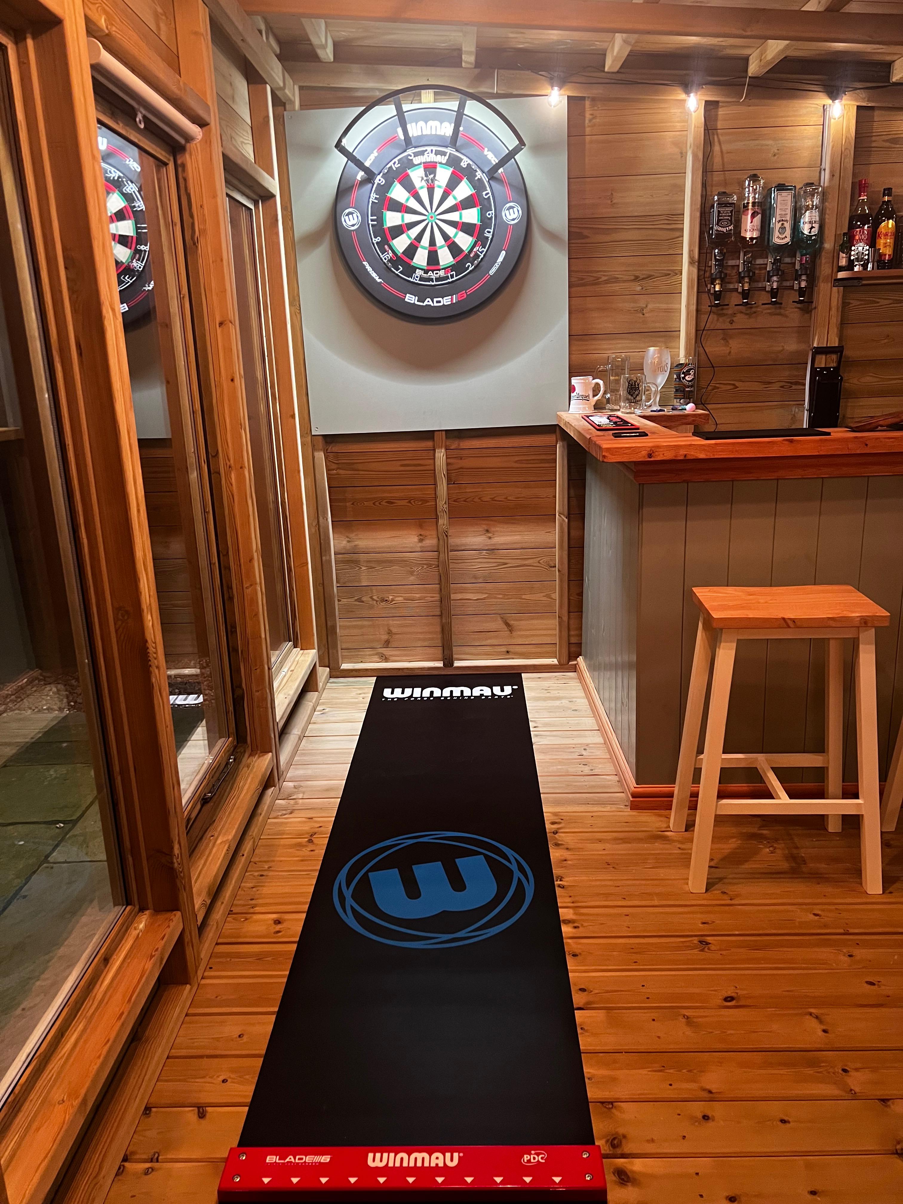Dartboard in place in my garden pub, “The Hip Joint” (I am an orthopaedic surgeon)