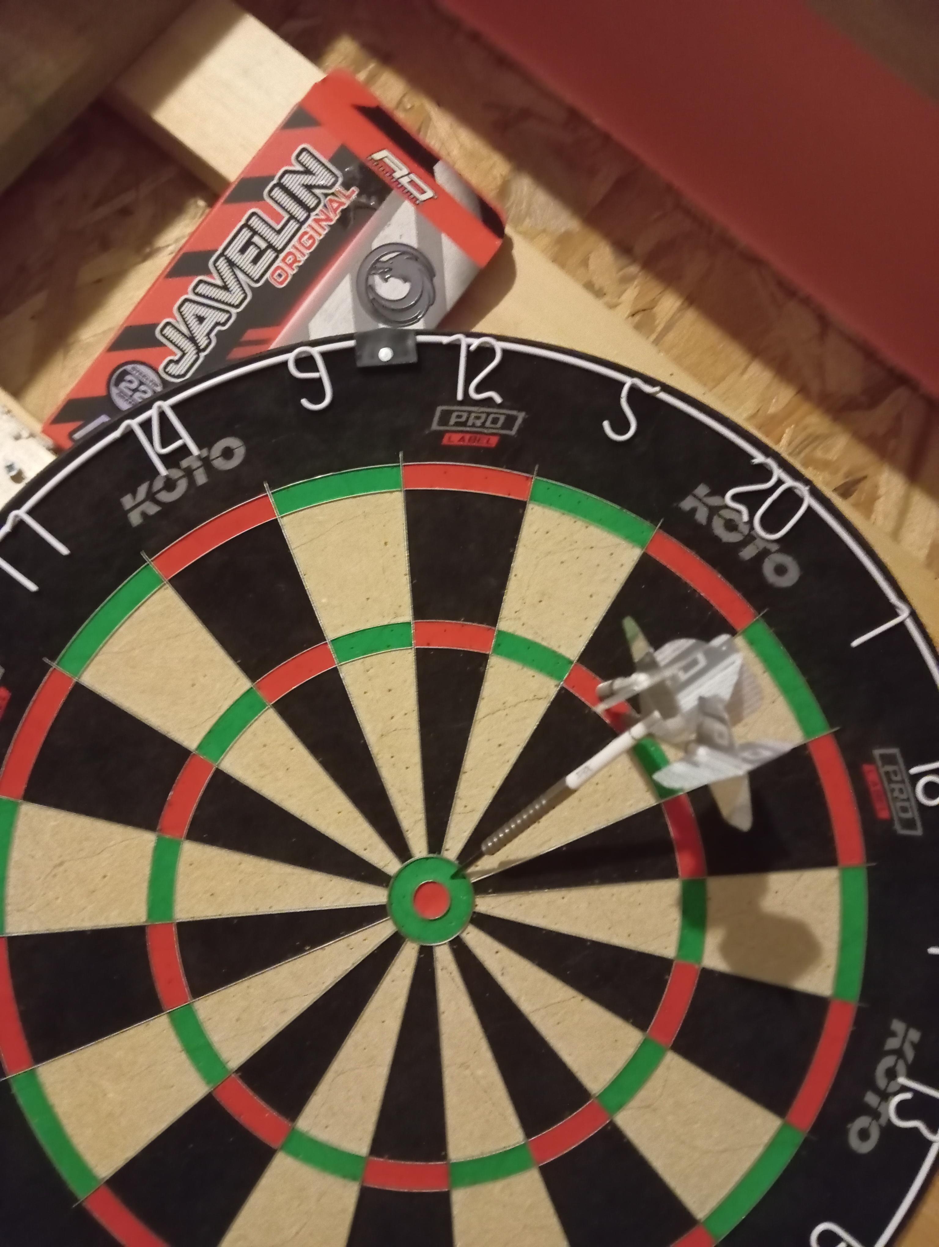 My dartboard with darts